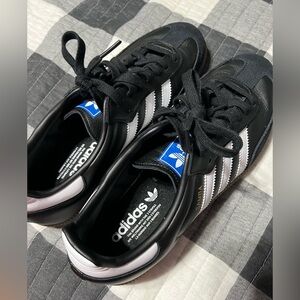 Adidas women’s Black and White Sneakers